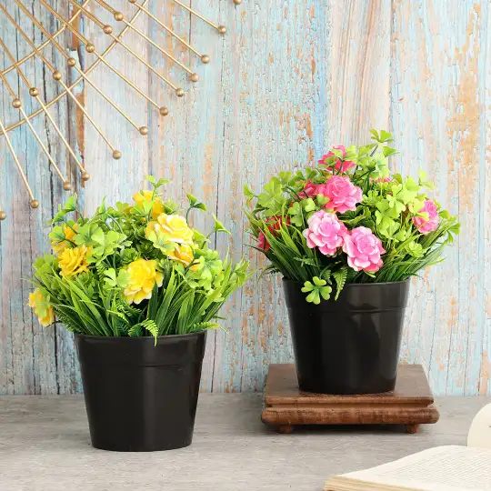 Artificial Plants With Yellow and Pink Roses